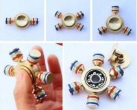 * BRINQUEDO HAND SPINNER FERRO DOURADO HEXAGONAL